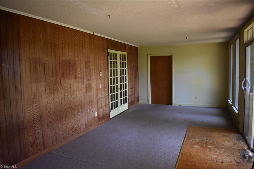 239 Surry Avenue Elkin, NC 28621 - Photo 14 of 25 Back Sunroom
