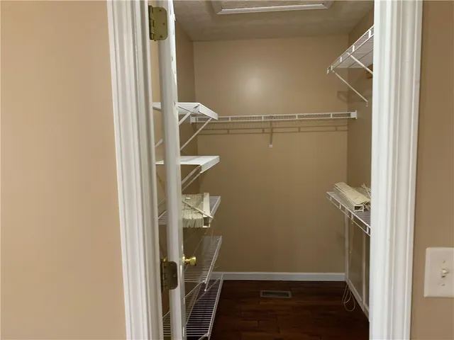 a bathroom with a sink and shower