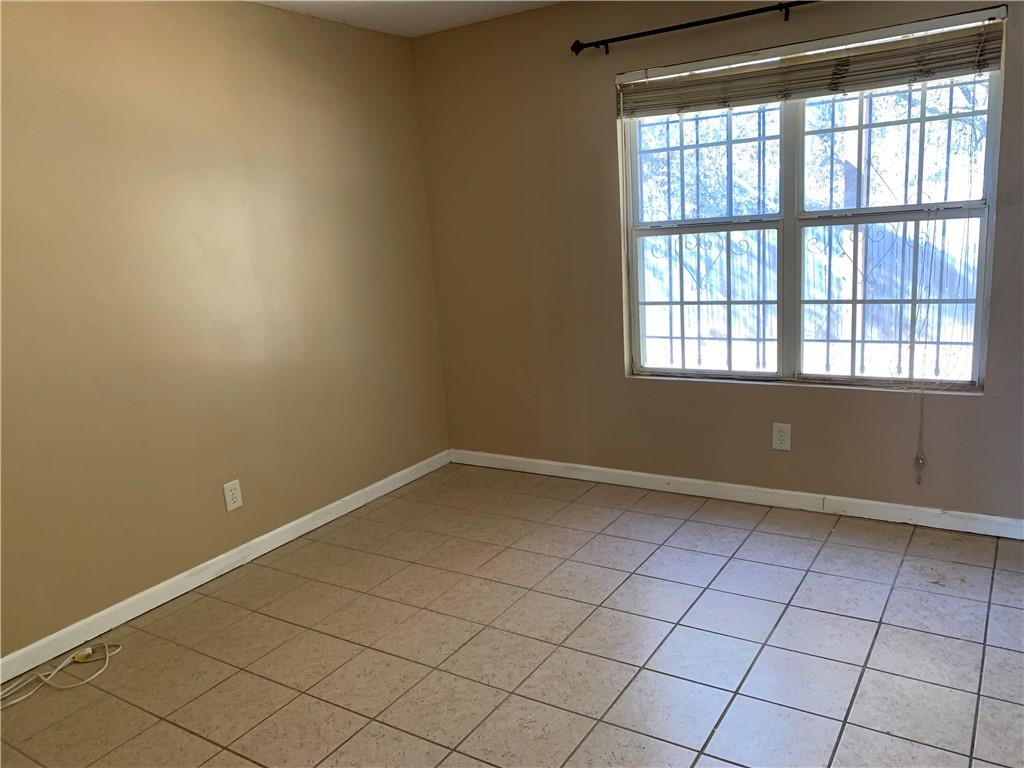 2195 Clayton Ridge Lithonia, GA 30058 - Photo 20 of 23 a view of an empty room and window