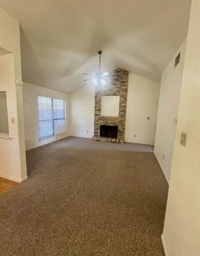728 West San Antonio Street, Unit 728A Lockhart, TX 78644 - Photo 3 of 11 a view of empty room with a fireplace
