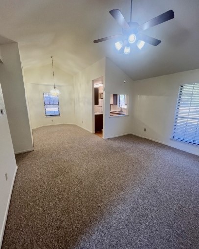 728 West San Antonio Street, Unit 728A Lockhart, TX 78644 - Photo 4 of 11 en empty room with windows and fan