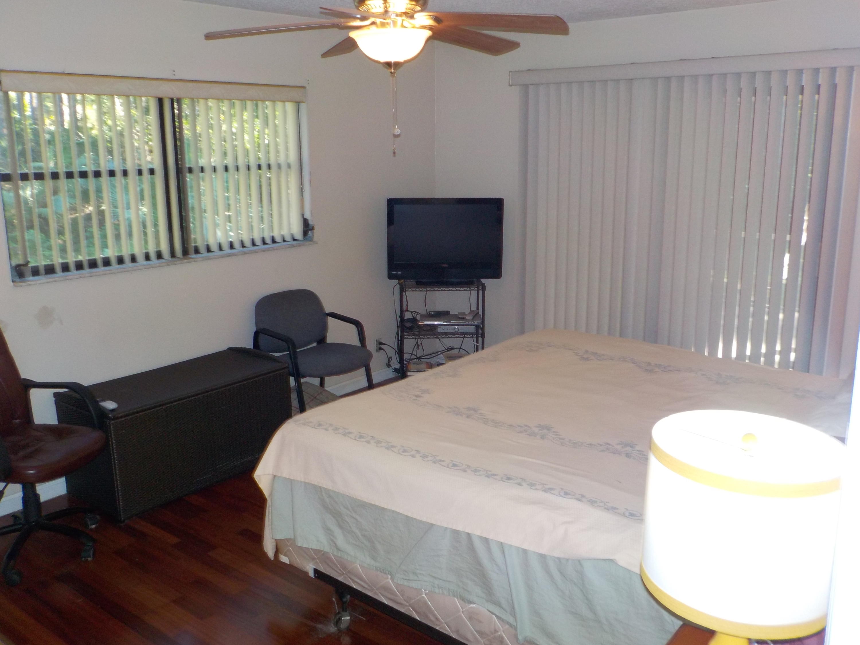 13882 153rd Road North Jupiter, FL 33478 - Photo 9 of 23 Master Bedroom