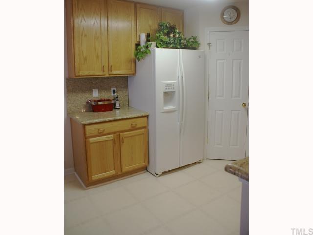3905 Iverson Street Raleigh, NC 27604 - Photo 5 of 12 Refrigerator (GE Profile) conveys