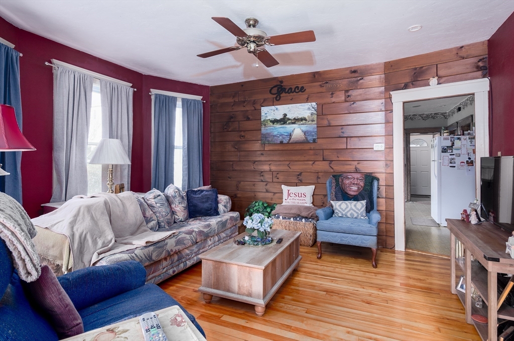 63 Pilgrim Avenue Worcester, MA 01604 - Photo 16 of 23 a living room with furniture and wooden floor