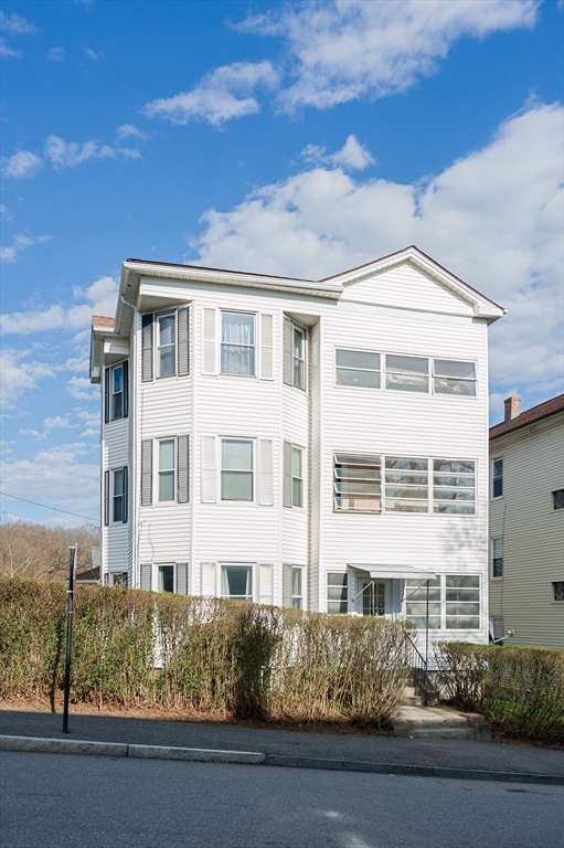 63 Pilgrim Avenue Worcester, MA 01604 - Photo 2 of 23 a front view of a house