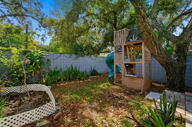 a view of a street with shops