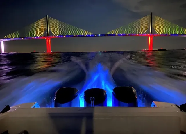 a view of a street with cars on road