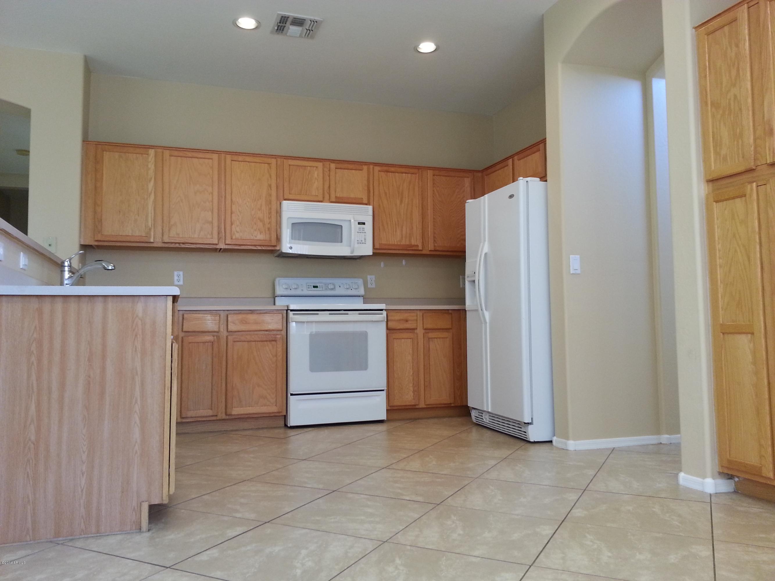 5675 West Evergreen Road Glendale, AZ 85302 - Photo 4 of 19 OAK CABINETS