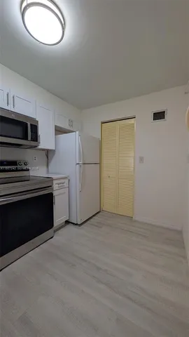 a view of a trees in a yard