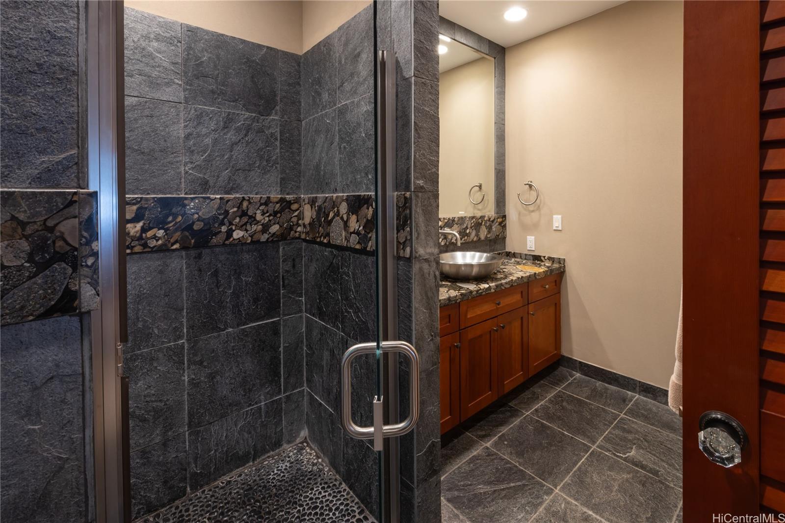 365 Portlock Road Honolulu, HI 96825 - Photo 16 of 25 a bathroom with a sink and toilet