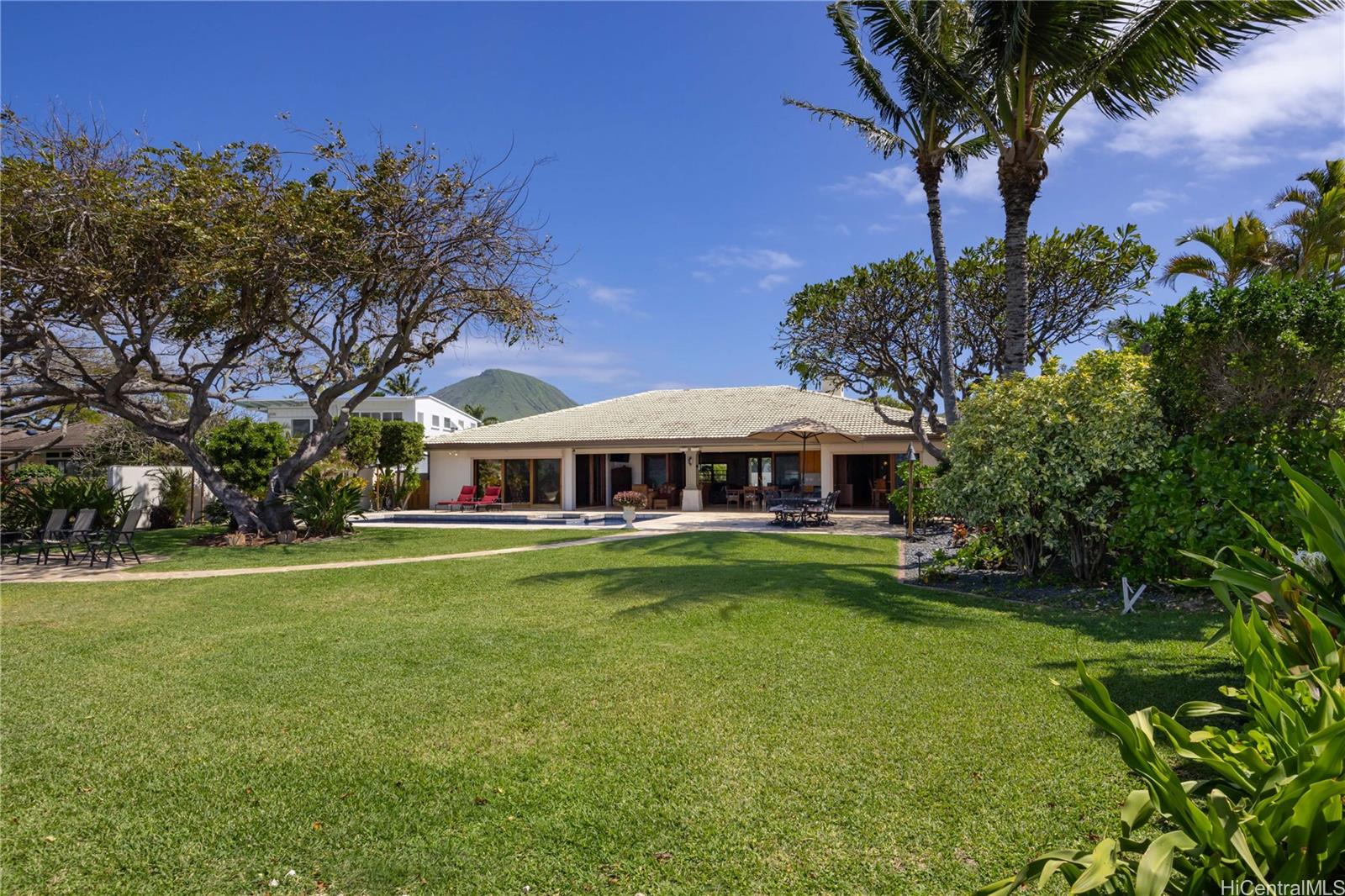 365 Portlock Road Honolulu, HI 96825 - Photo 17 of 25 a view of a house with a big yard