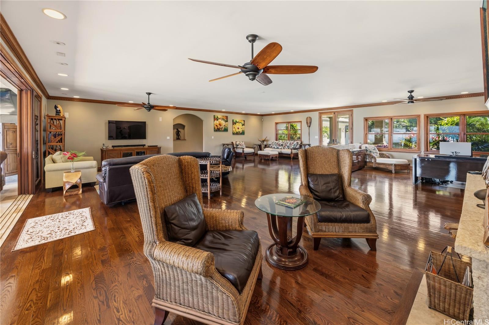 365 Portlock Road Honolulu, HI 96825 - Photo 7 of 25 a living room with furniture and a flat screen tv