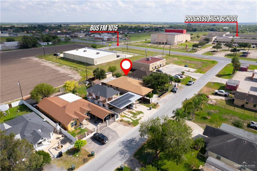 118 J R Becerra Avenue Progreso, TX 78596 - Photo 16 of 17 an aerial view of a house with a swimming pool yard and outdoor seating