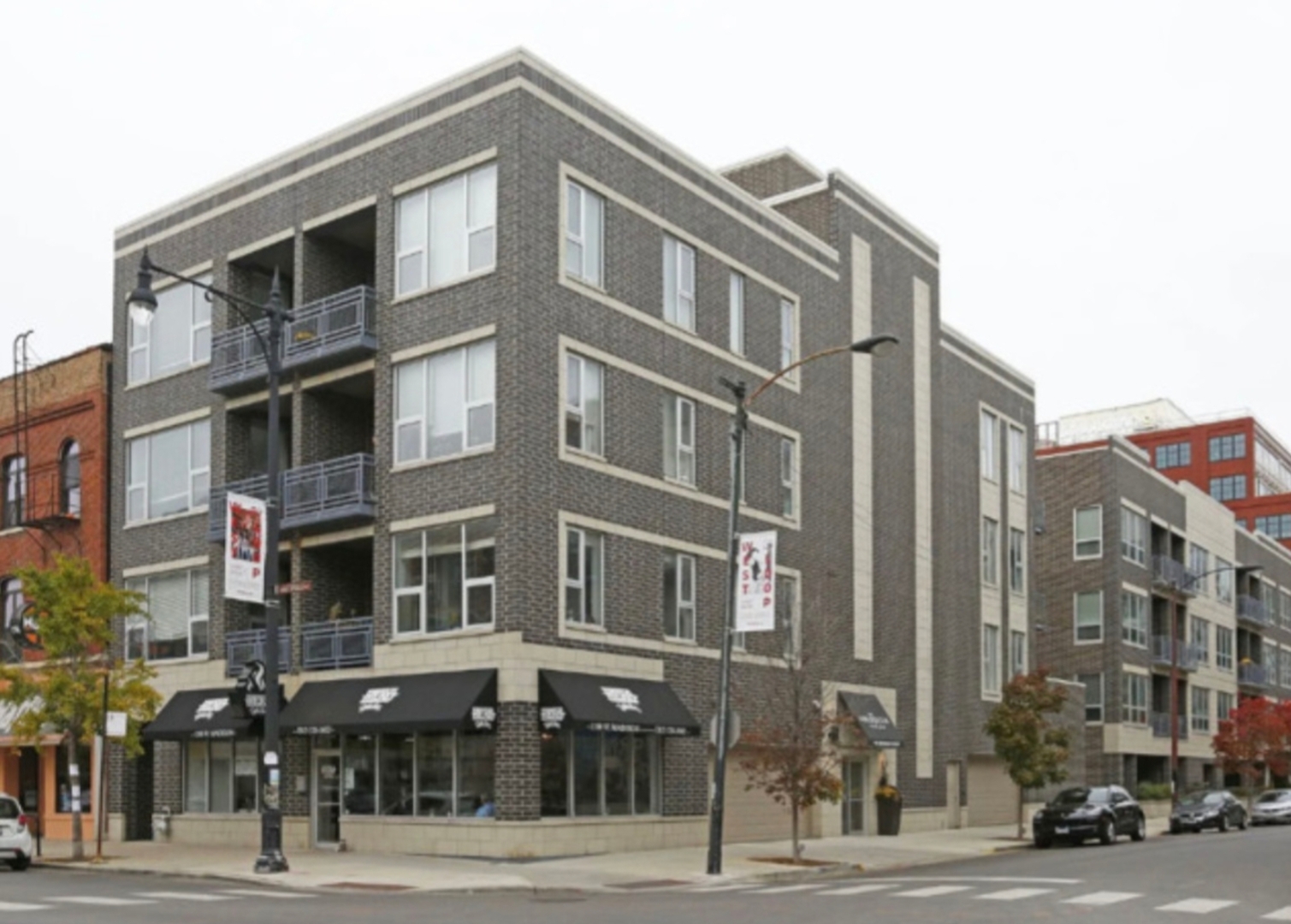 a front view of a building with a street