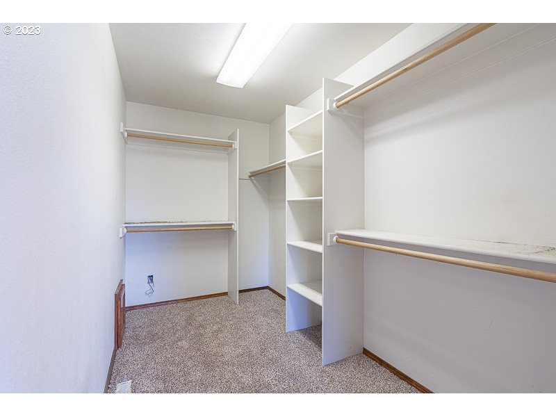 6295 Kings Ridge Road Dallas, OR 97338 - Photo 19 of 44 a view of an empty walk in closet
