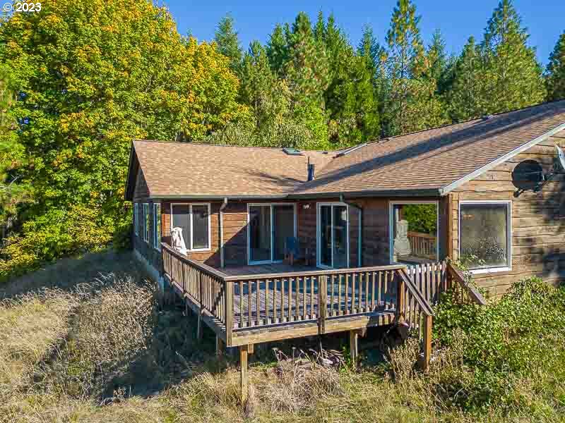 6295 Kings Ridge Road Dallas, OR 97338 - Photo 34 of 44 a view of a deck that has a deck