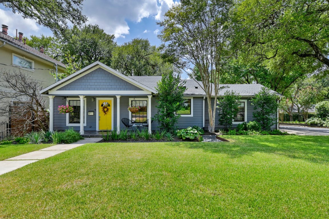 3321 Windsor Road Austin, TX 78703 - Photo 1 of 28 a front view of a house with a yard