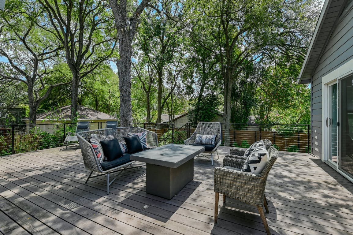3321 Windsor Road Austin, TX 78703 - Photo 17 of 28 a view of a patio with a dining table and chairs