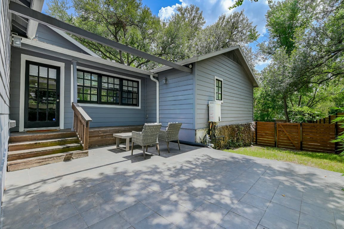 3321 Windsor Road Austin, TX 78703 - Photo 18 of 28 a view of a house with backyard porch and sitting area