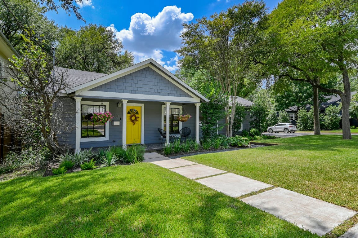 3321 Windsor Road Austin, TX 78703 - Photo 21 of 28 a view of a house with a big yard plants and large trees