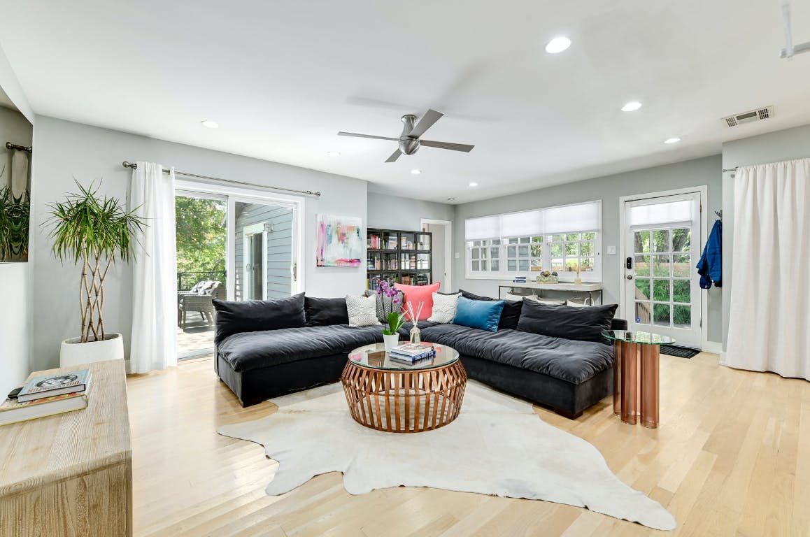 3321 Windsor Road Austin, TX 78703 - Photo 28 of 28 a living room with furniture potted plant and a large window