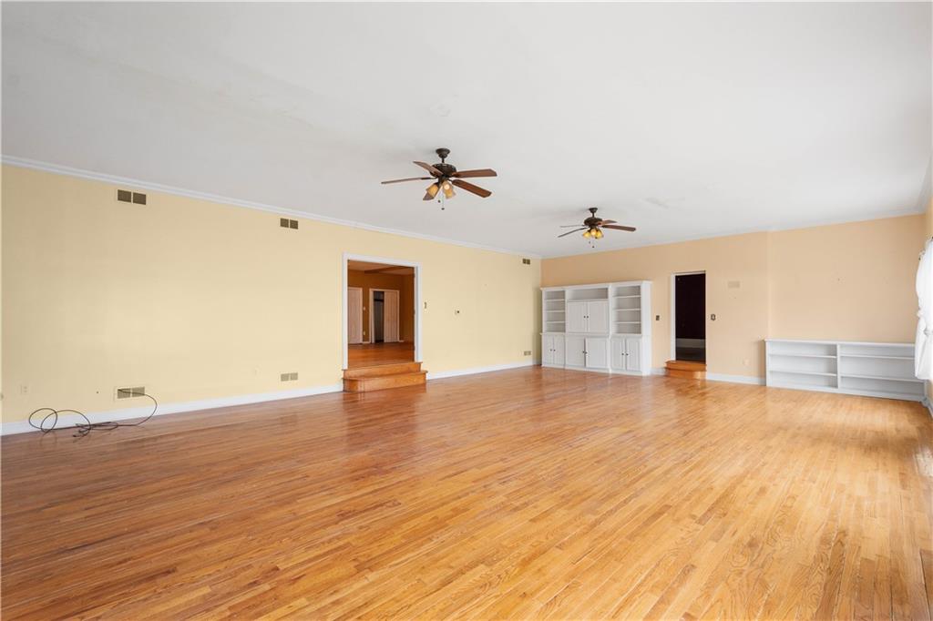 36 Little Mingo Road Finleyville, PA 15332 - Photo 12 of 50 wooden floor in an empty room with a window