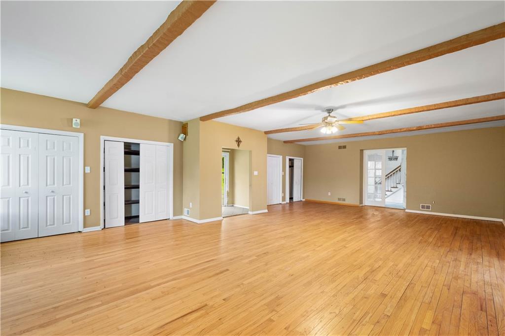 36 Little Mingo Road Finleyville, PA 15332 - Photo 13 of 50 a view of an empty room with wooden floor and windows
