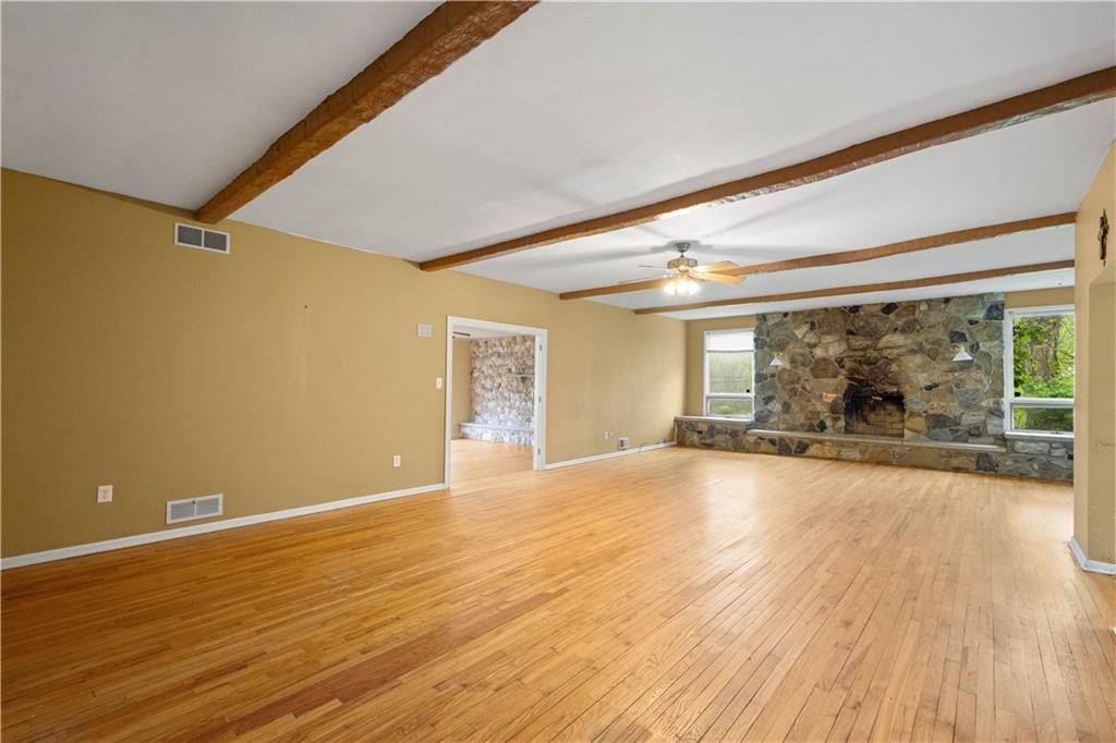 36 Little Mingo Road Finleyville, PA 15332 - Photo 15 of 50 a view of an empty room with wooden floor and a window