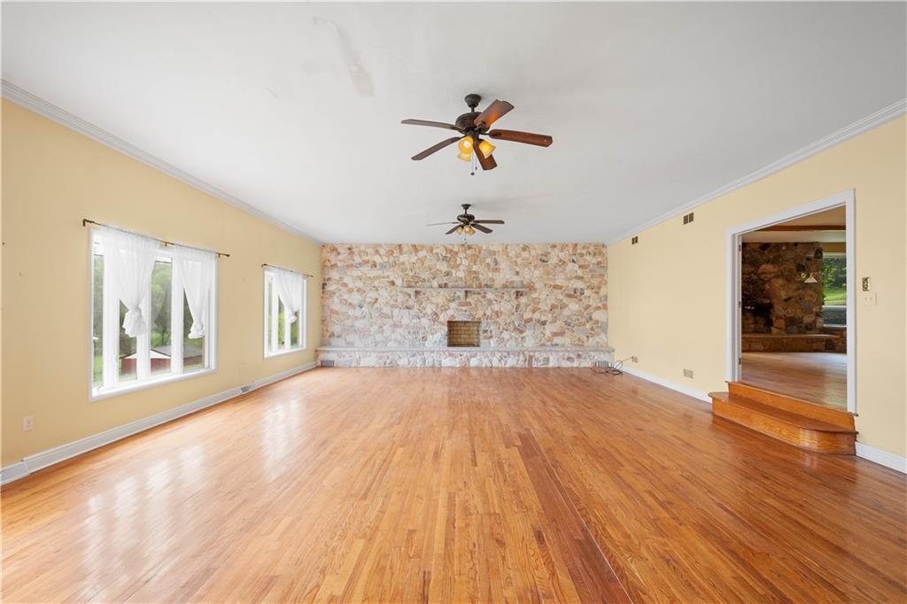 36 Little Mingo Road Finleyville, PA 15332 - Photo 21 of 50 a view of empty room with wooden floor and fan