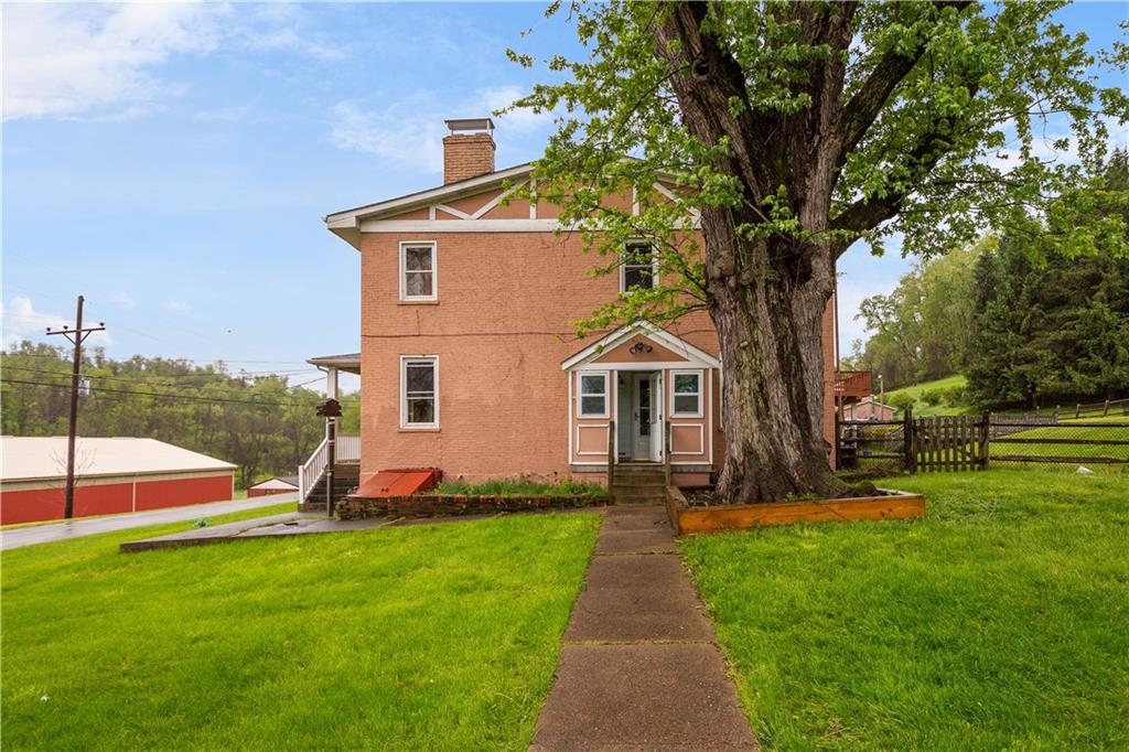 36 Little Mingo Road Finleyville, PA 15332 - Photo 8 of 50 a front view of a house with garden
