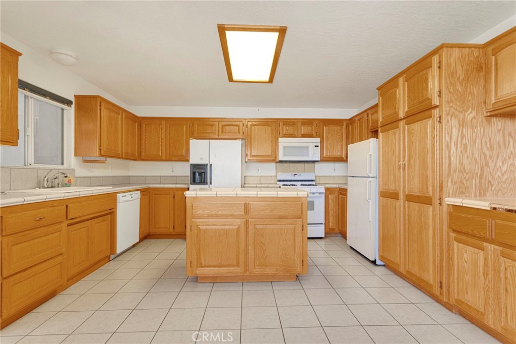 11281 4th Hesperia, CA 92345 - Photo 11 of 35 Two refrigerators in kitchen - so unique