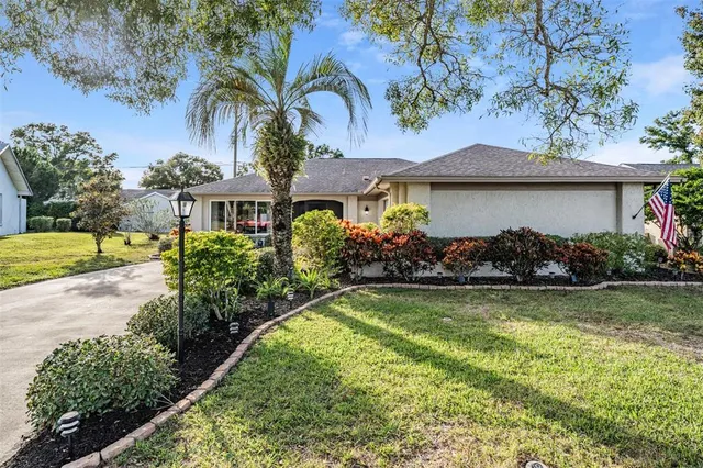$425,000 | 2932 Macalpin Drive West, Palm Harbor, FL 34684