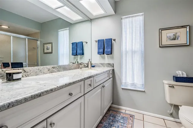 $425,000 | 2932 Macalpin Drive West, Palm Harbor, FL 34684