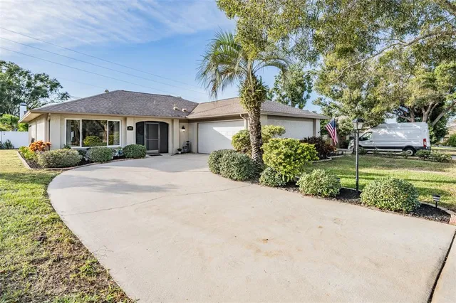 $425,000 | 2932 Macalpin Drive West, Palm Harbor, FL 34684