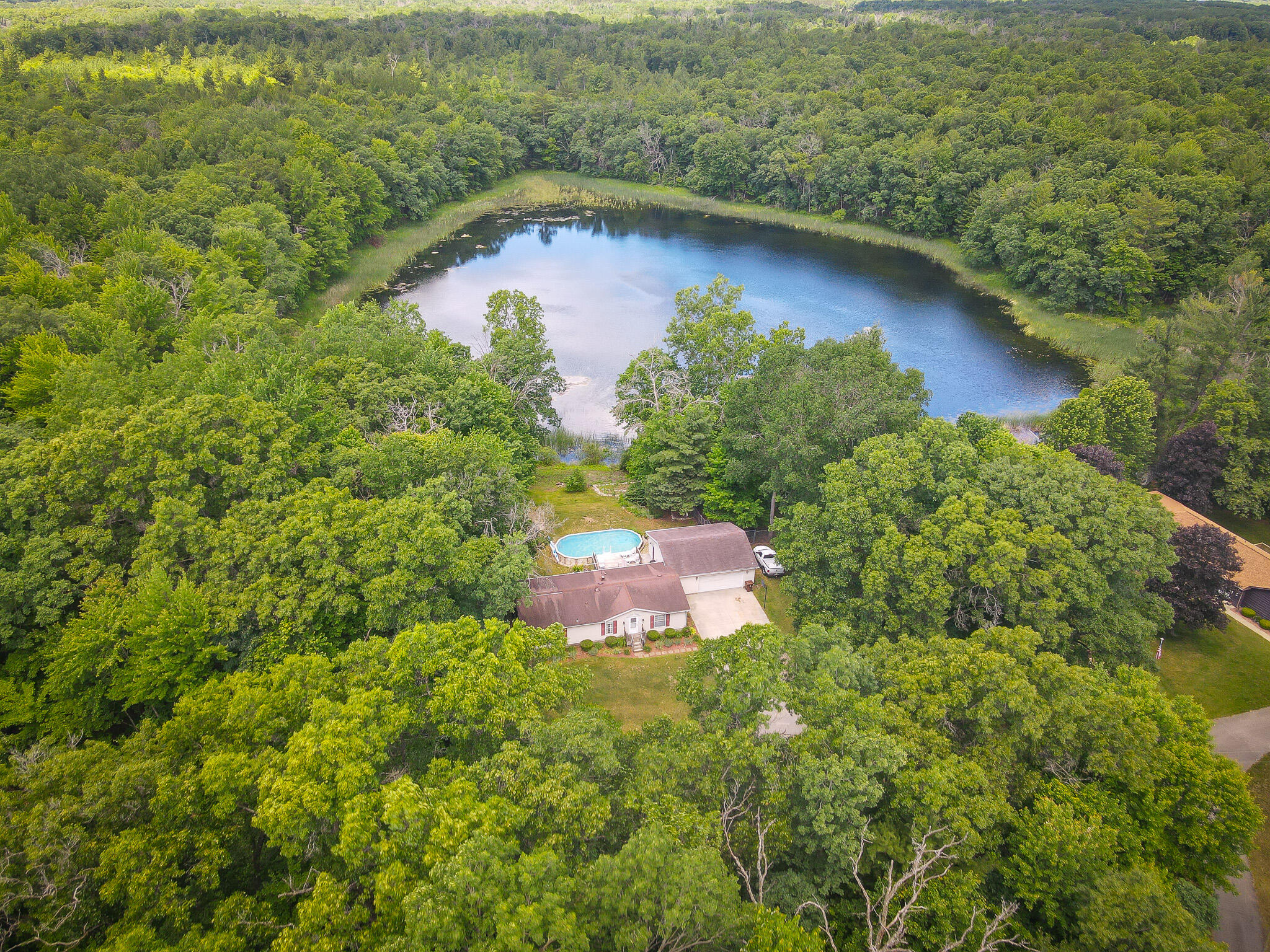 9339 Maple Hill Road Howard City, MI 49329 - Photo 2 of 42 DJI_0968