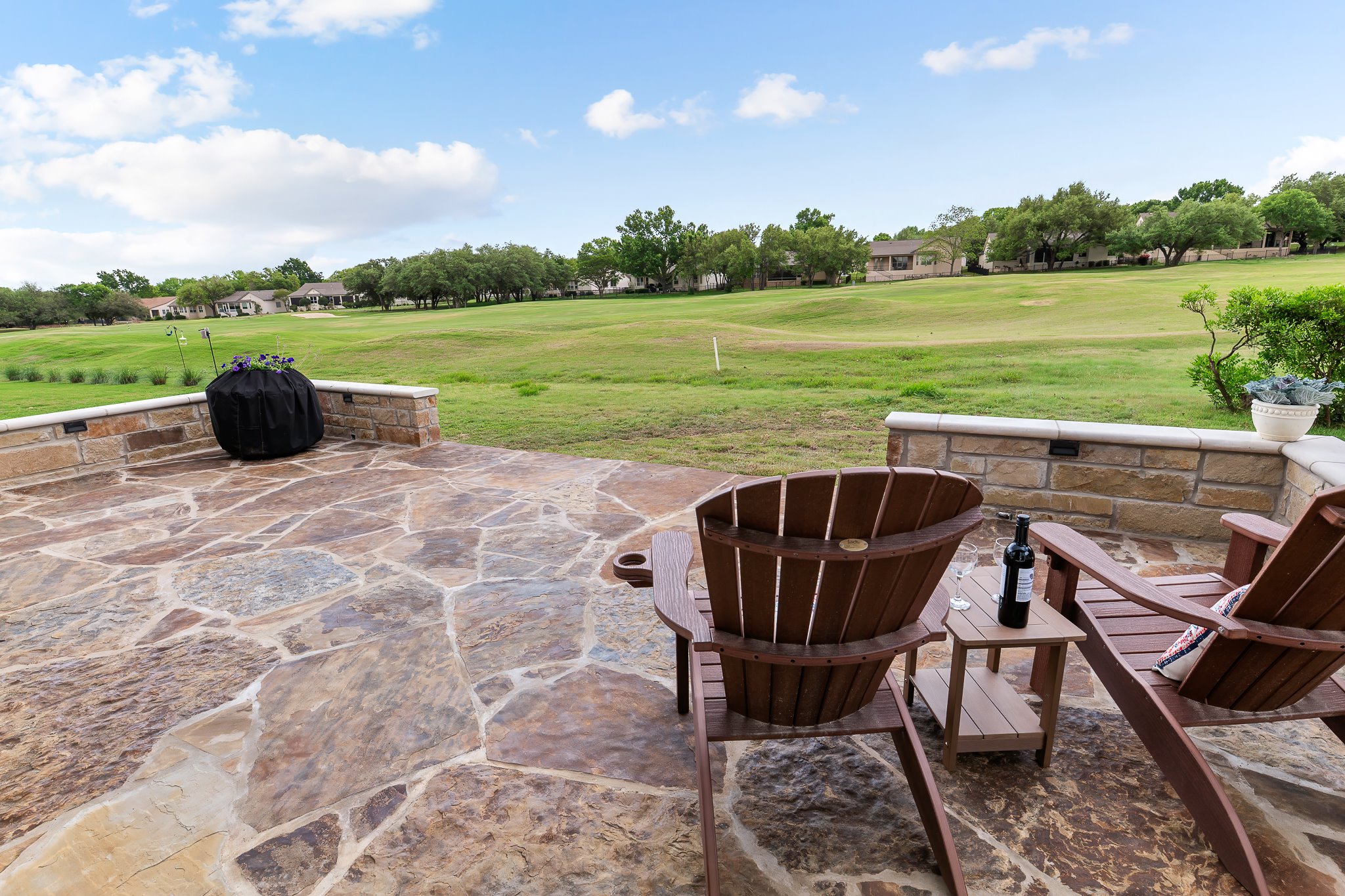 130 Crepe Myrtle Lane Georgetown, TX 78633 - Photo 30 of 40 Oklahoma stone patio overlooking the 11th Fairway at Legacy golf course