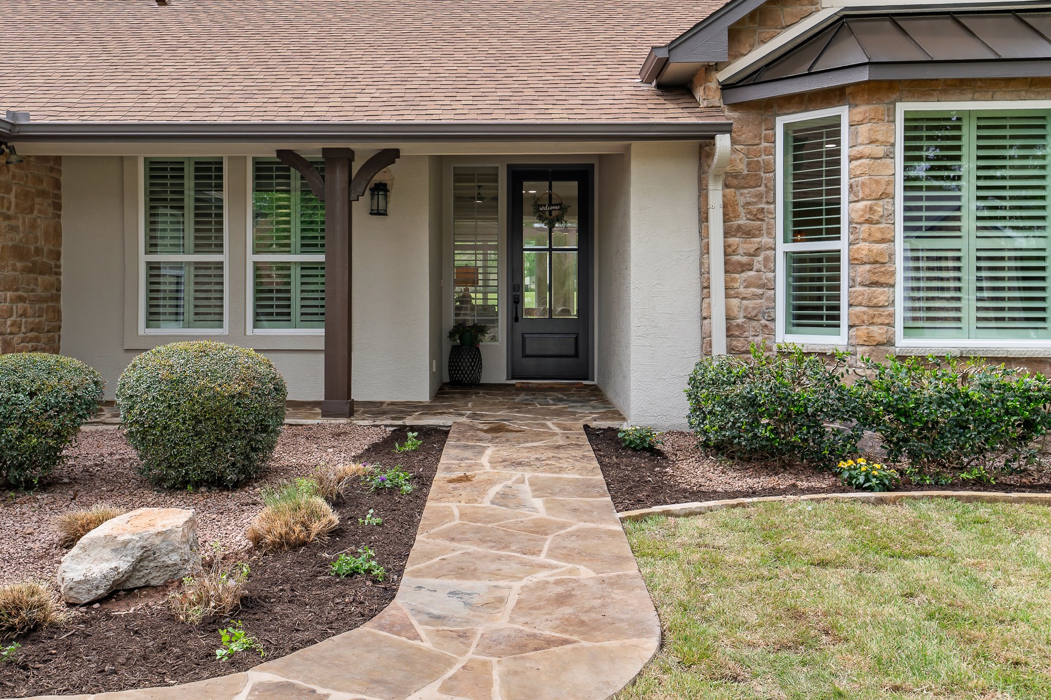 130 Crepe Myrtle Lane Georgetown, TX 78633 - Photo 6 of 40 Oklahoma stone walkway (no steps!) and solid cedar column lead to the new mahogany front door.