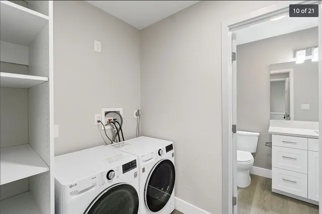 a utility room with dryer and washer