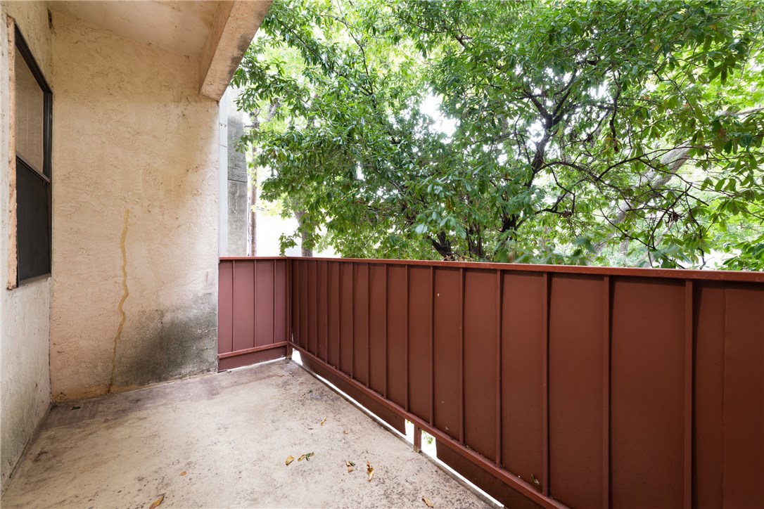 706 West 22nd Street, Unit 202 Austin, TX 78705 - Photo 19 of 24 a view of wooden fence