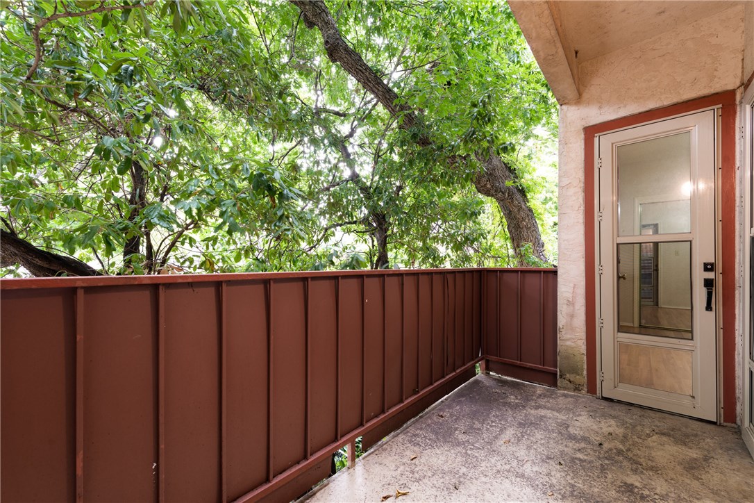 706 West 22nd Street, Unit 202 Austin, TX 78705 - Photo 20 of 24 a view of wooden fence in the backyard