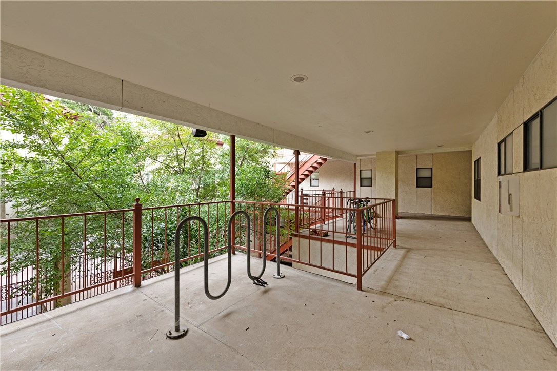 706 West 22nd Street, Unit 202 Austin, TX 78705 - Photo 22 of 24 a view of a balcony with chairs