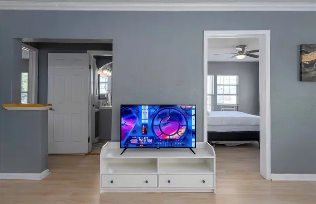a view of an entryway with wooden floor