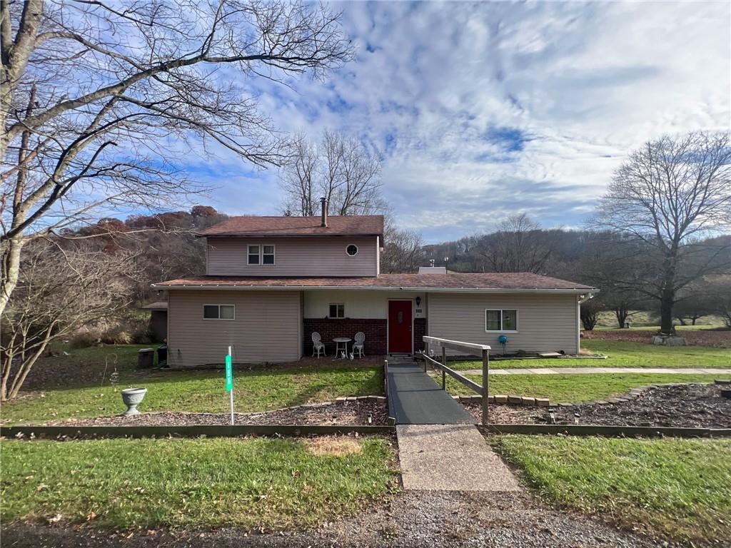 140 Fox Road Apollo, PA 15613 - Photo 4 of 24 a view of a house with a yard