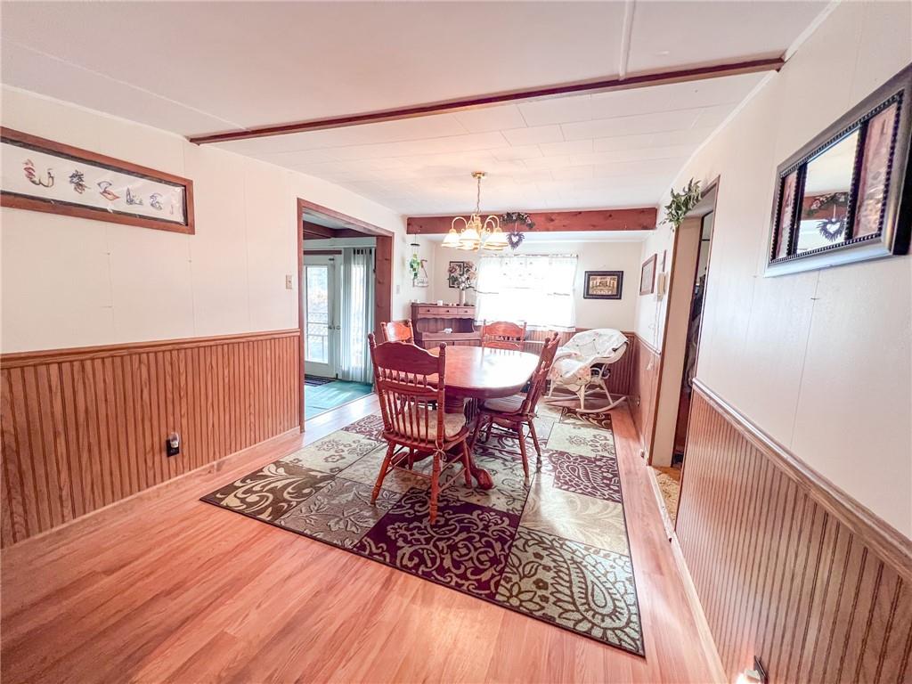 140 Fox Road Apollo, PA 15613 - Photo 7 of 24 a view of a dining room with furniture window and wooden floor