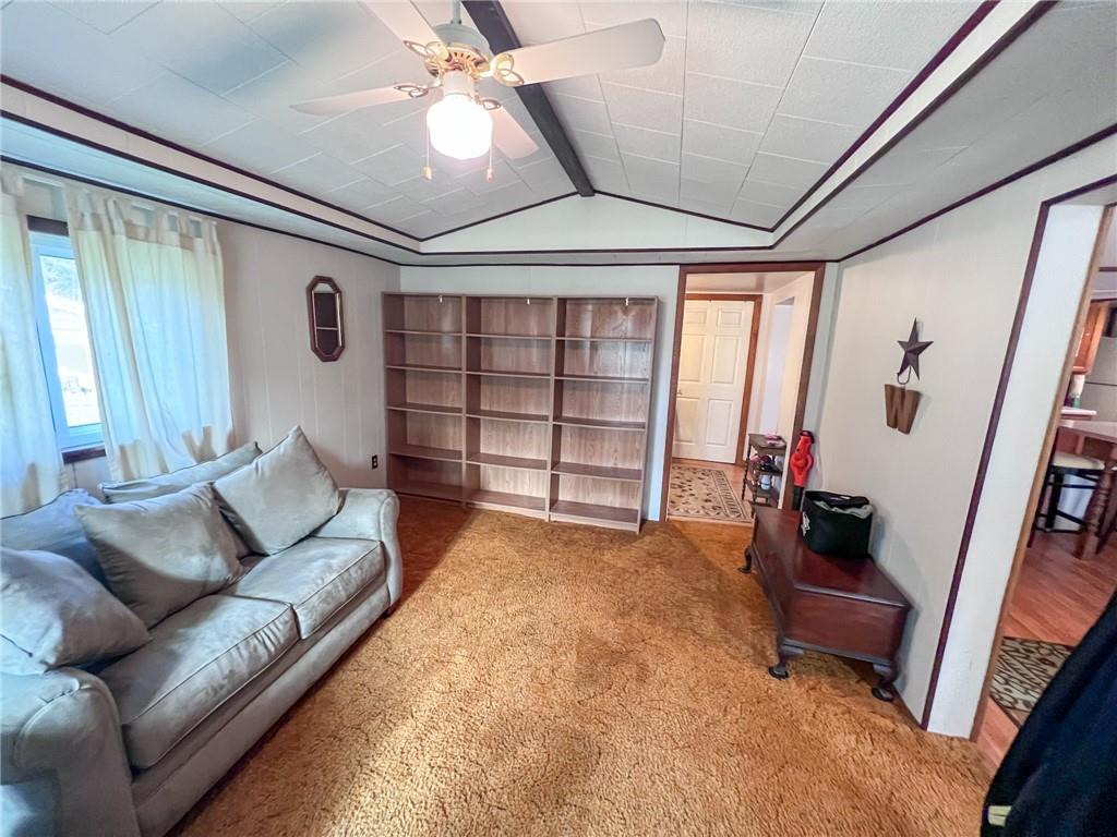 140 Fox Road Apollo, PA 15613 - Photo 8 of 24 a living room with furniture and a flat screen tv