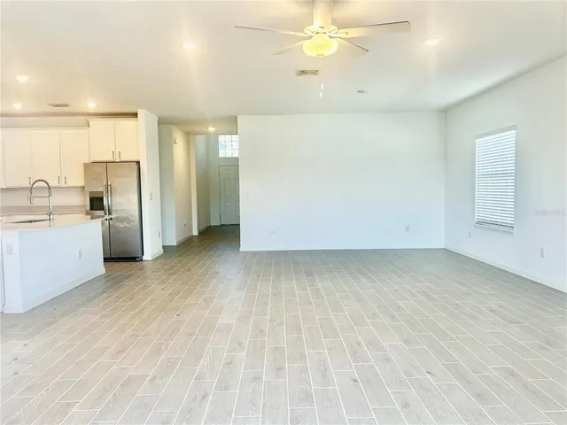 a view of a kitchen with a sink