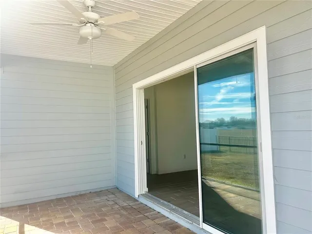 an empty room with fan