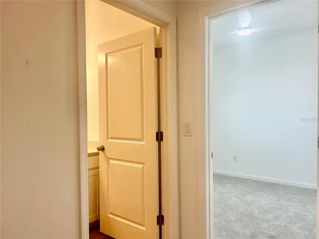 a view of a bathroom with a glass door