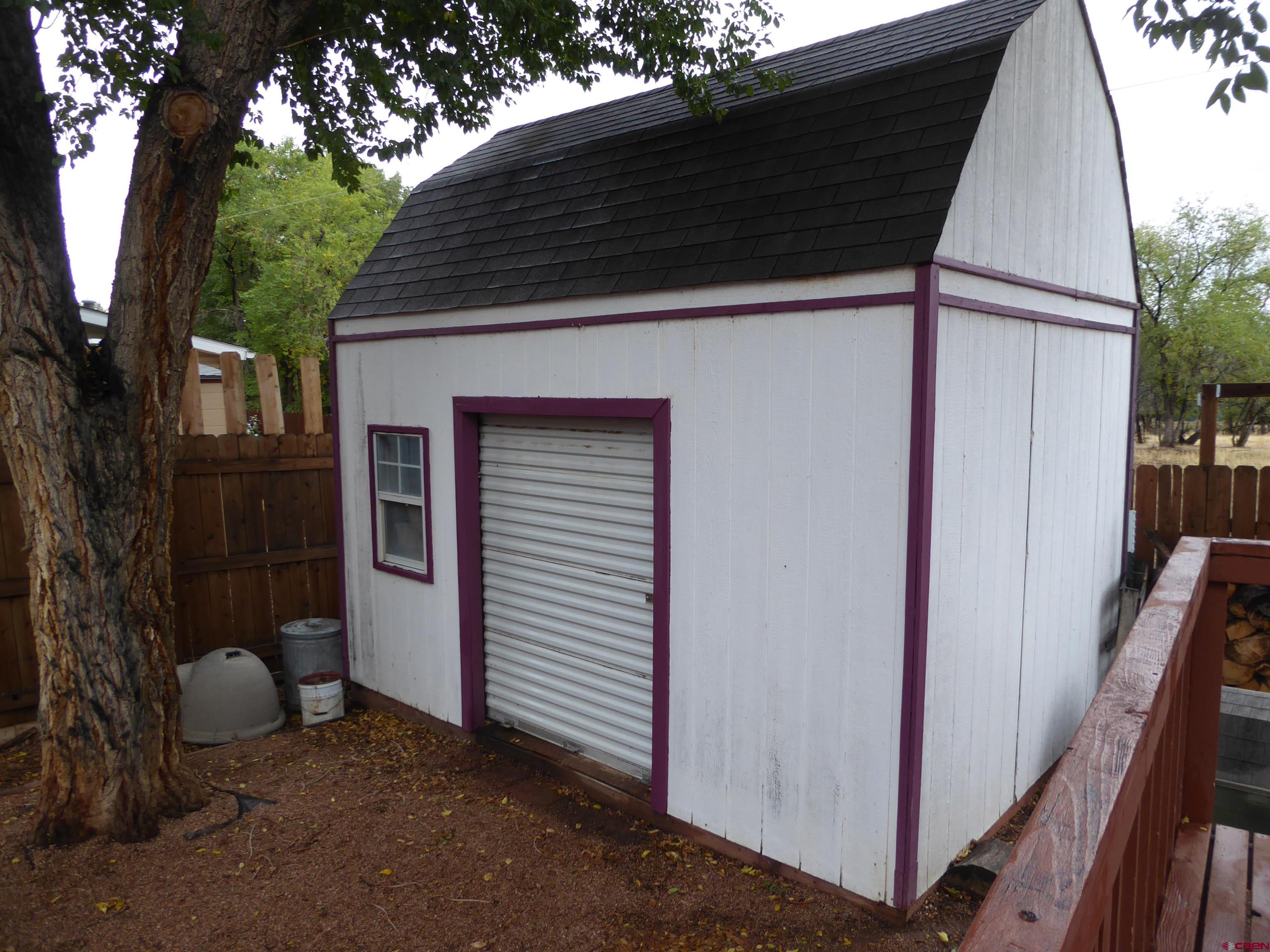 180 Northwest 7th Street Cedaredge, CO 81413 - Photo 11 of 44 a view of a back yard of the house