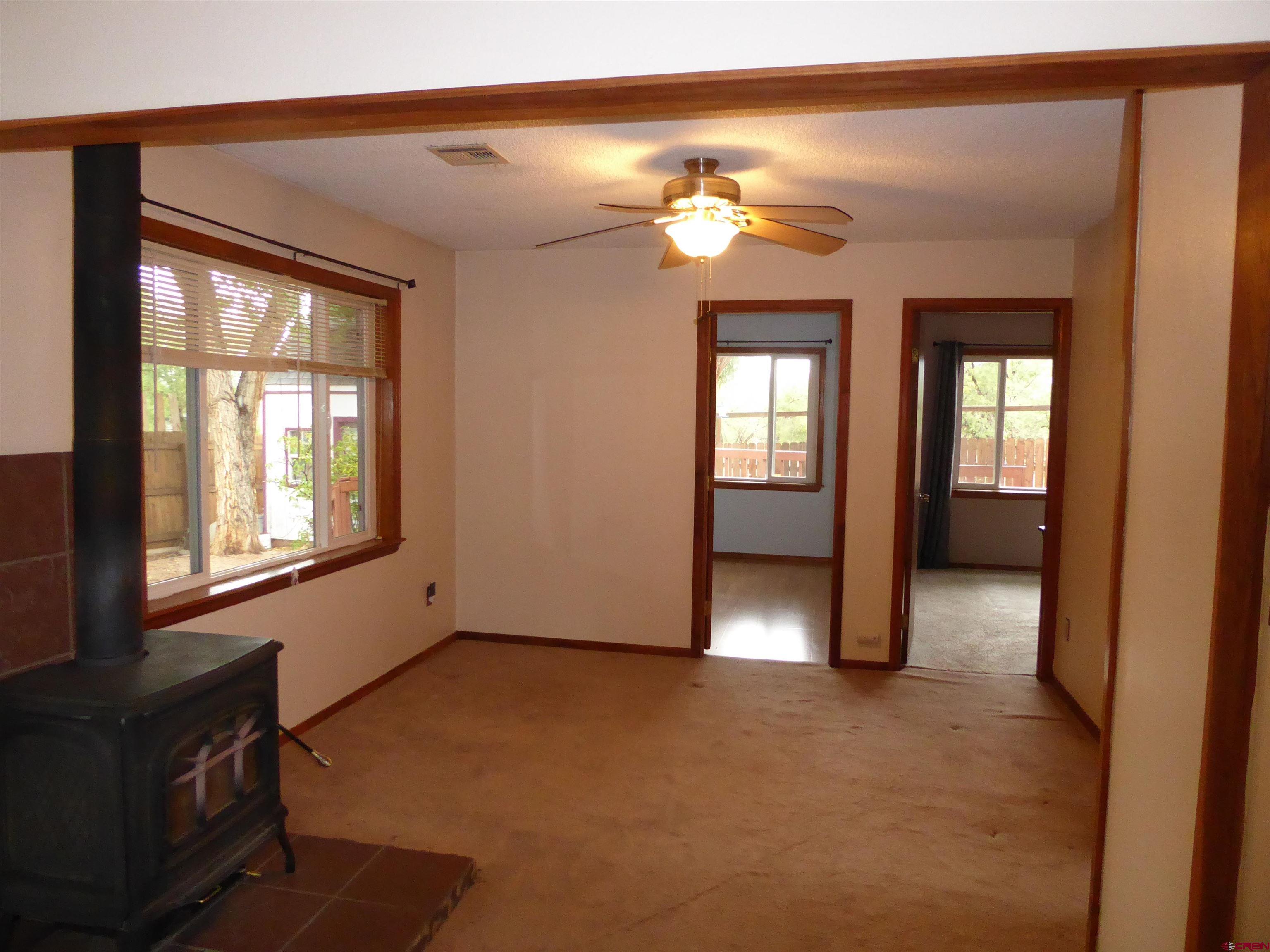 180 Northwest 7th Street Cedaredge, CO 81413 - Photo 17 of 44 a view of an empty room with a window